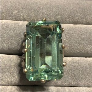 Silver ring with large greenish jewel size 8